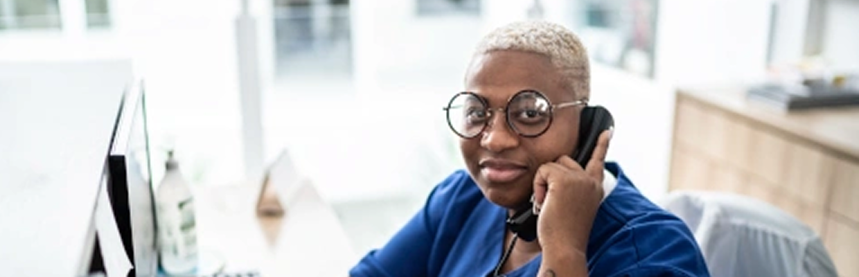 a hidden laborer toils on the phone