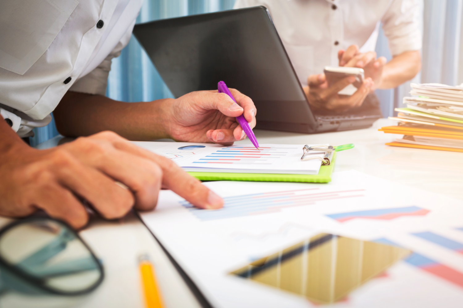 Analyzing financial charts for debt recovery strategies.