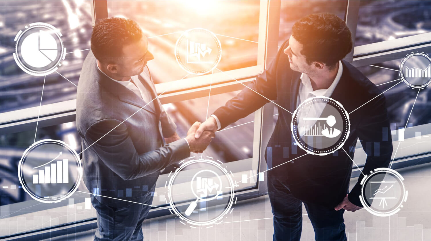 Businessmen shaking hands with overlay of data graphics representing commercial debt collection.