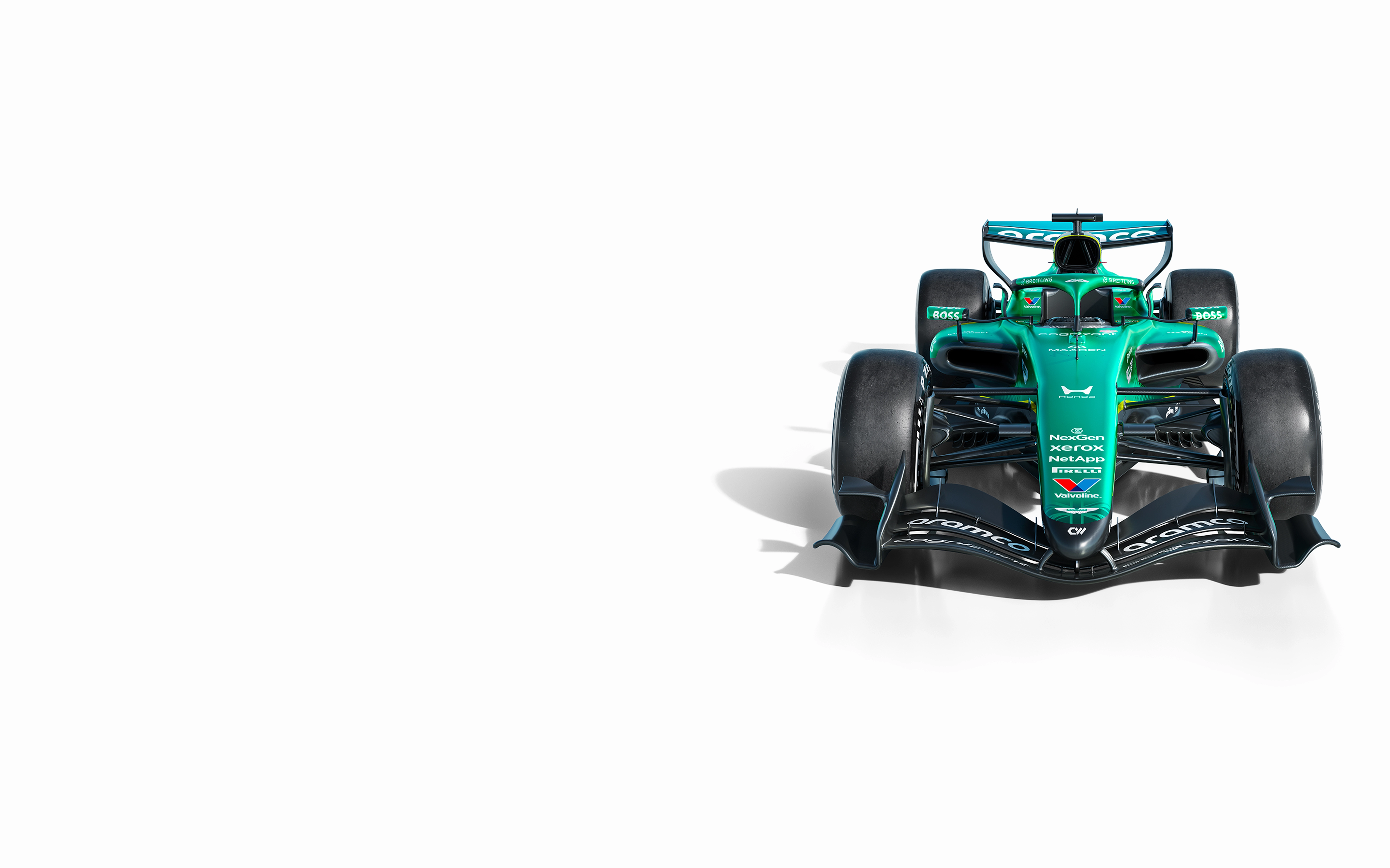Front view of Aston Martin Aramco Formula 1 car on light gray background