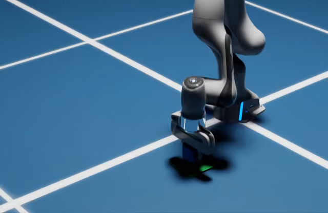 Franka arm gripping a blue cube from a changed pickup position