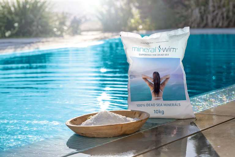 Image of woman holding sign