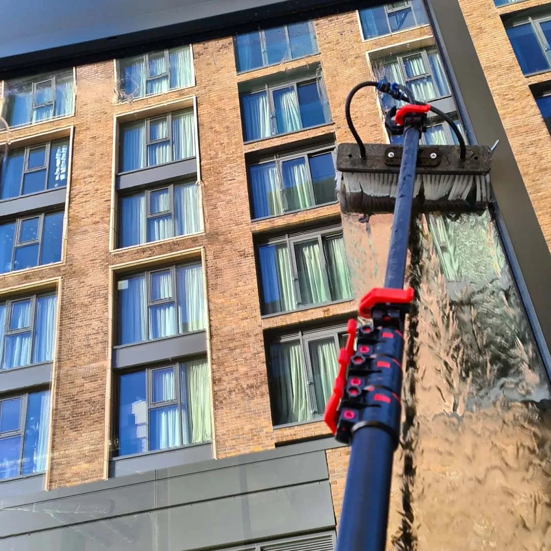 Eco Green cleaning windows on a Bridgend home