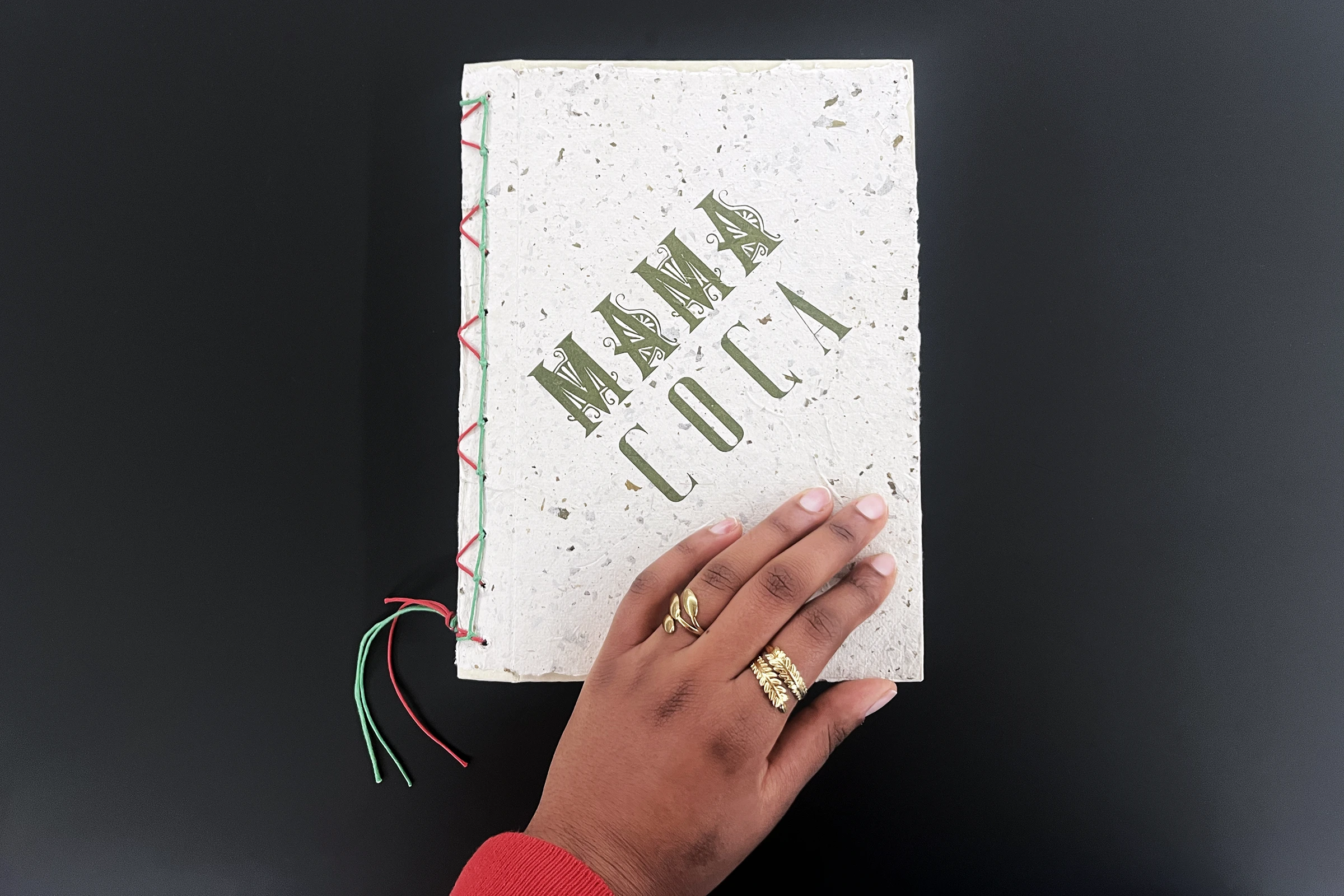  Cover of the photobook, paper made from coca leaf scraps so that from the outset the reader can connect with the plant on a sensorial level.
