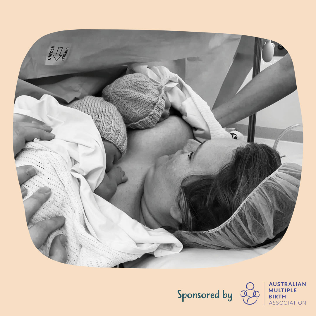 Laura holds her twins to her chestt, immediately after giving birth.