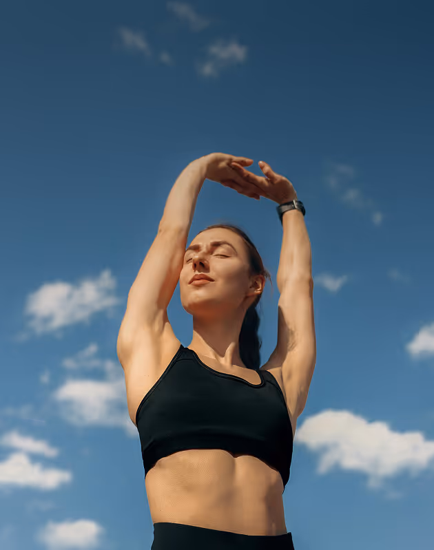 Photo of a young woman stretching