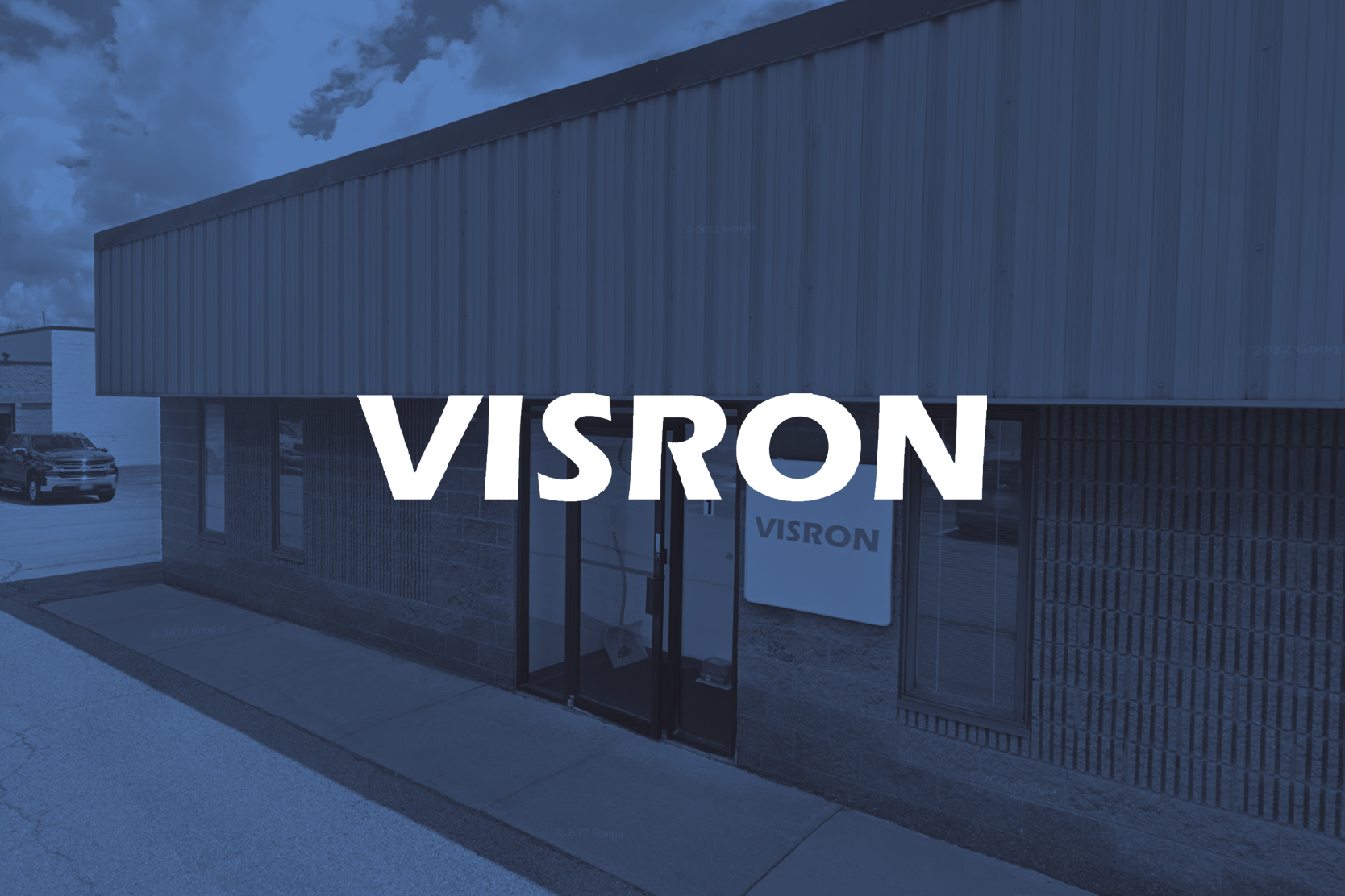 Visron Automation website hero section with logo on a blue background