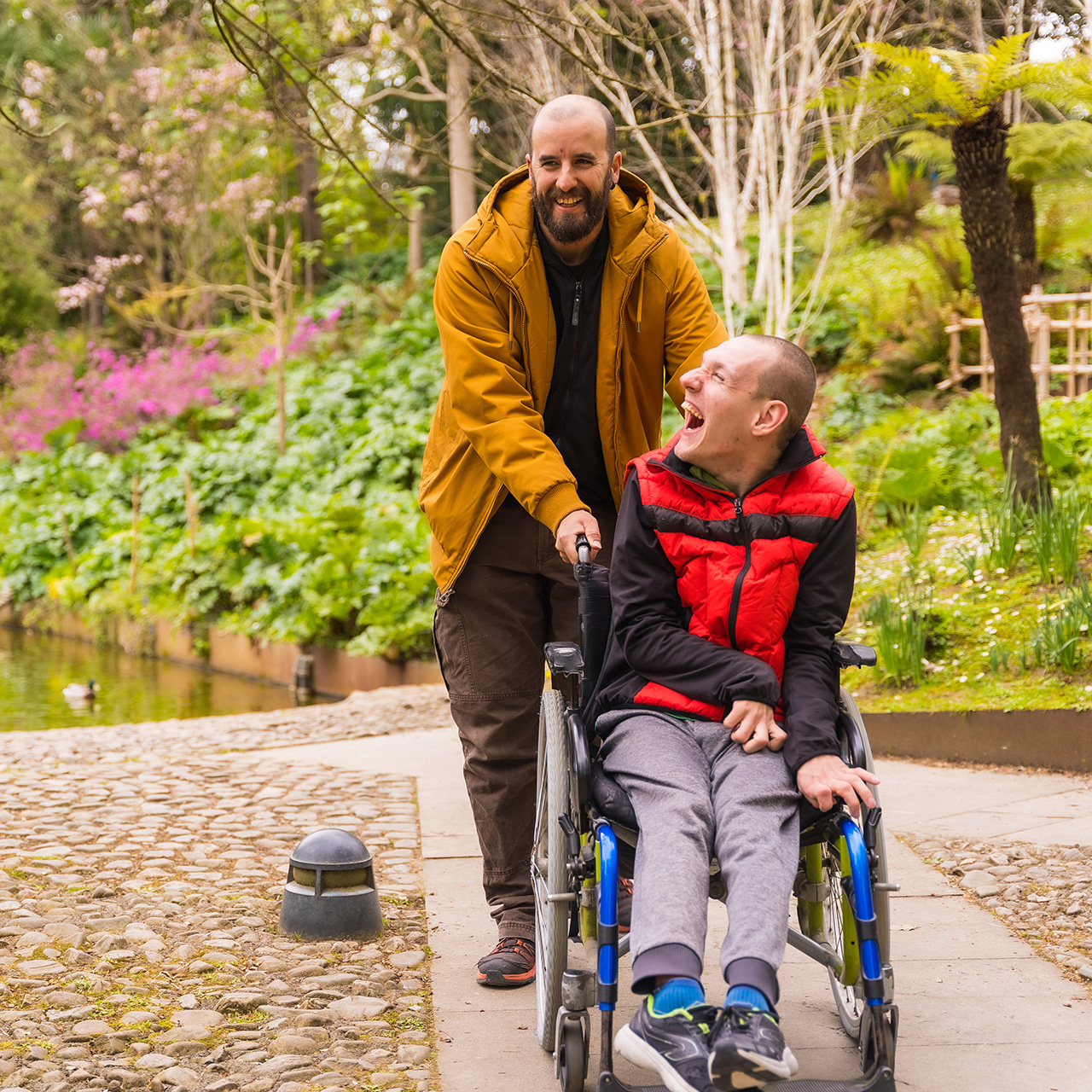 Advocate dances with Community Support Services Participant