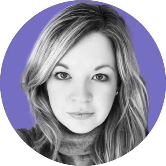 Black and white close-up portrait of a woman with long hair wearing a turtleneck sweater against a purple circular background.