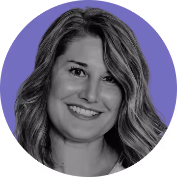 Smiling woman with wavy, shoulder-length hair against a purple circular background.