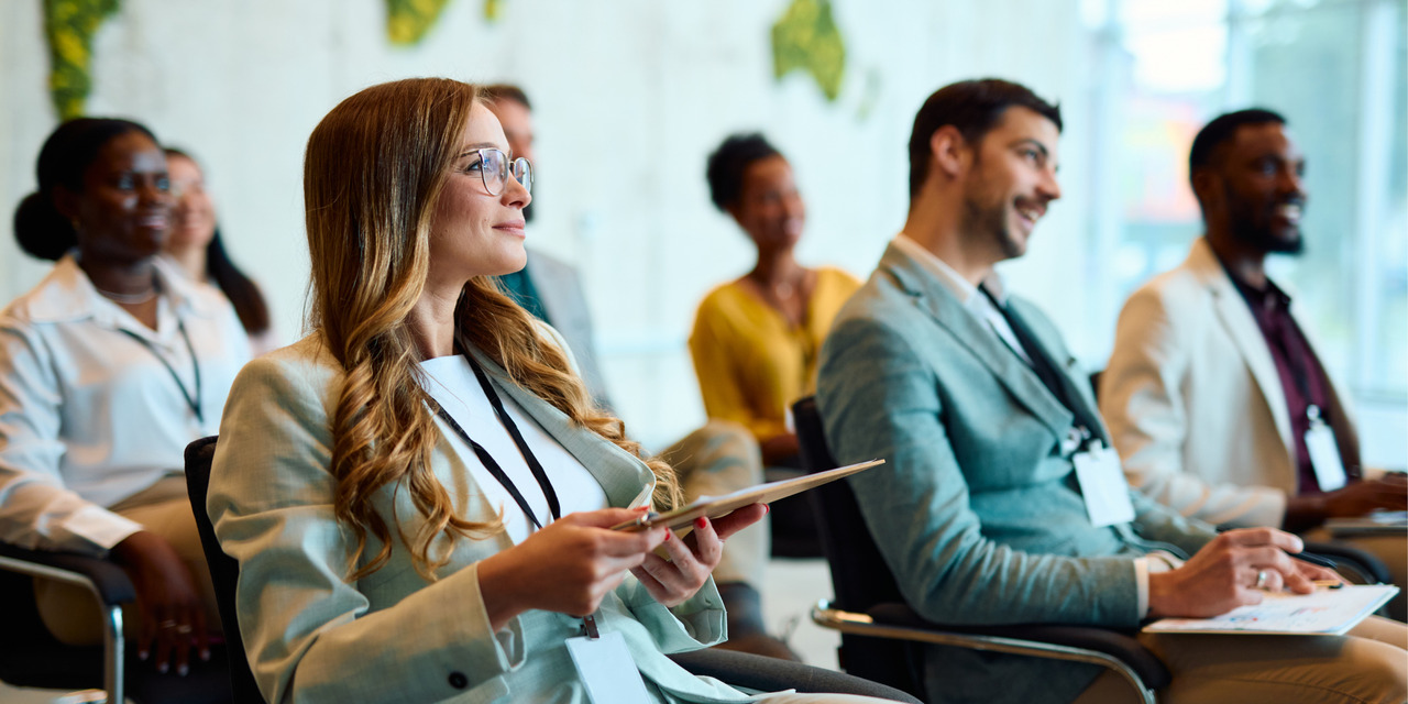 Group of professionals attending a training seminar, representing a Washington HOA webinar on WUCIOA 2026 updates.