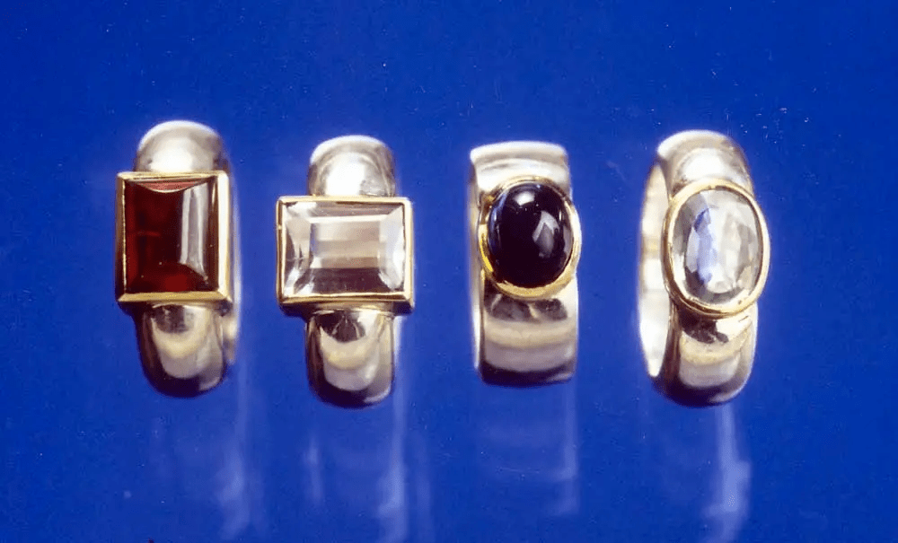 Massive Silberringe mit Gelbgoldfassung