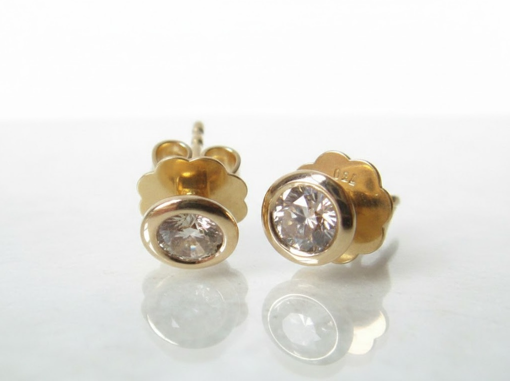 Ohrstecker mit solitären Diamanten