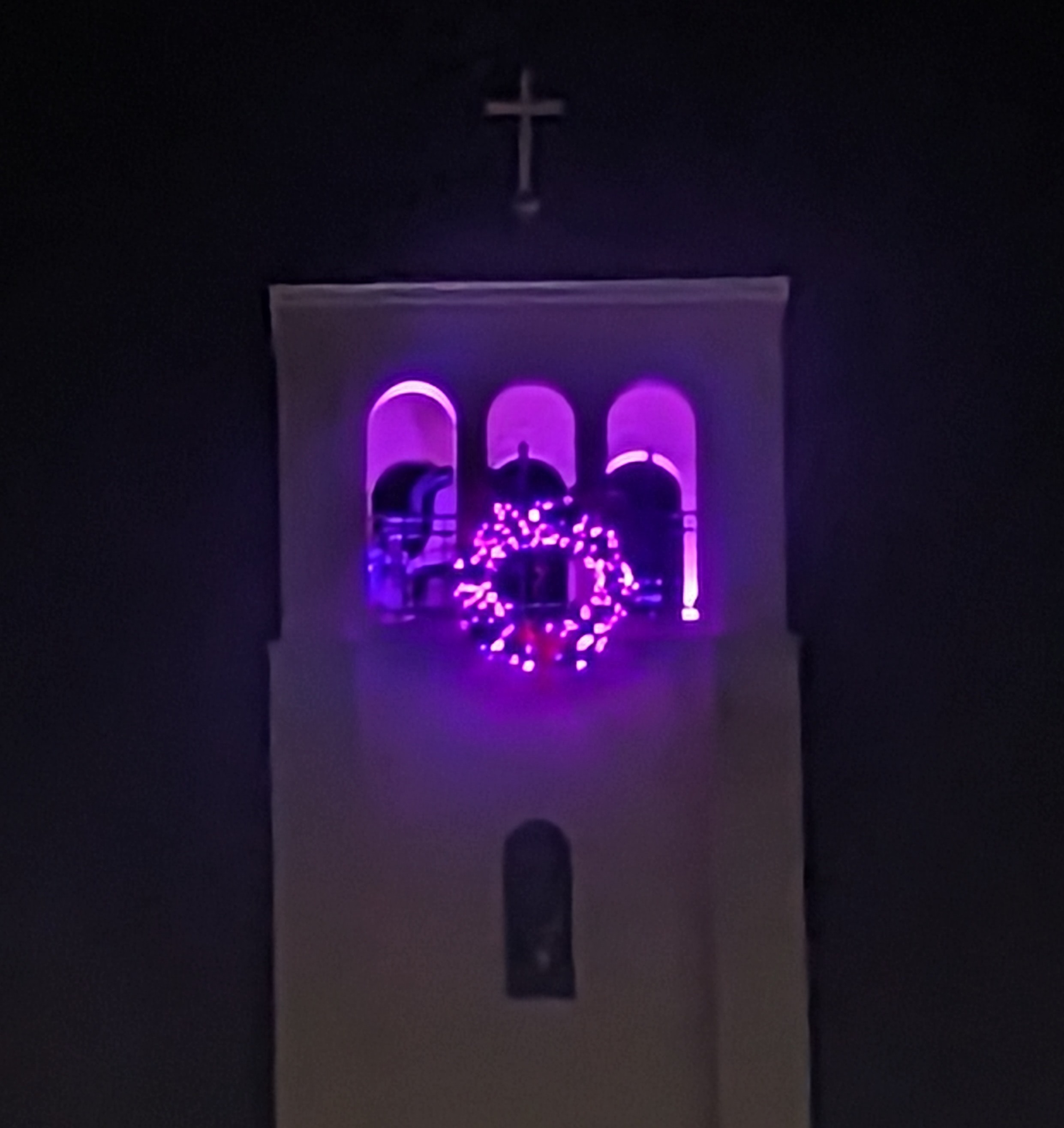 St. Gregory bell tower with Advent lights.