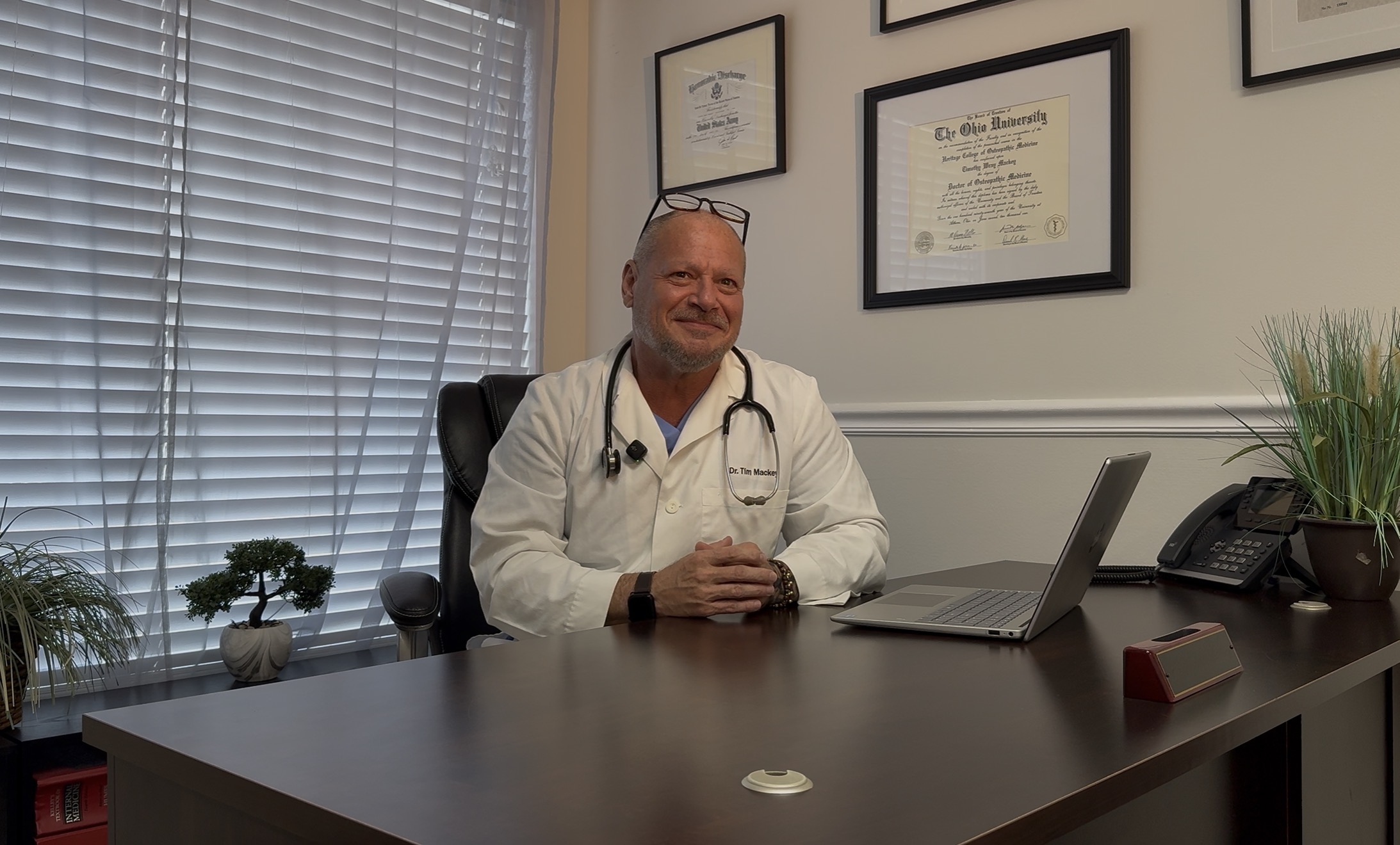 Timothy W. Mackey, D.O., Medical Director of NovaGenix, in his Jupiter office