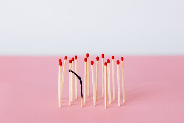 Matchsticks on Pink Backgrounf