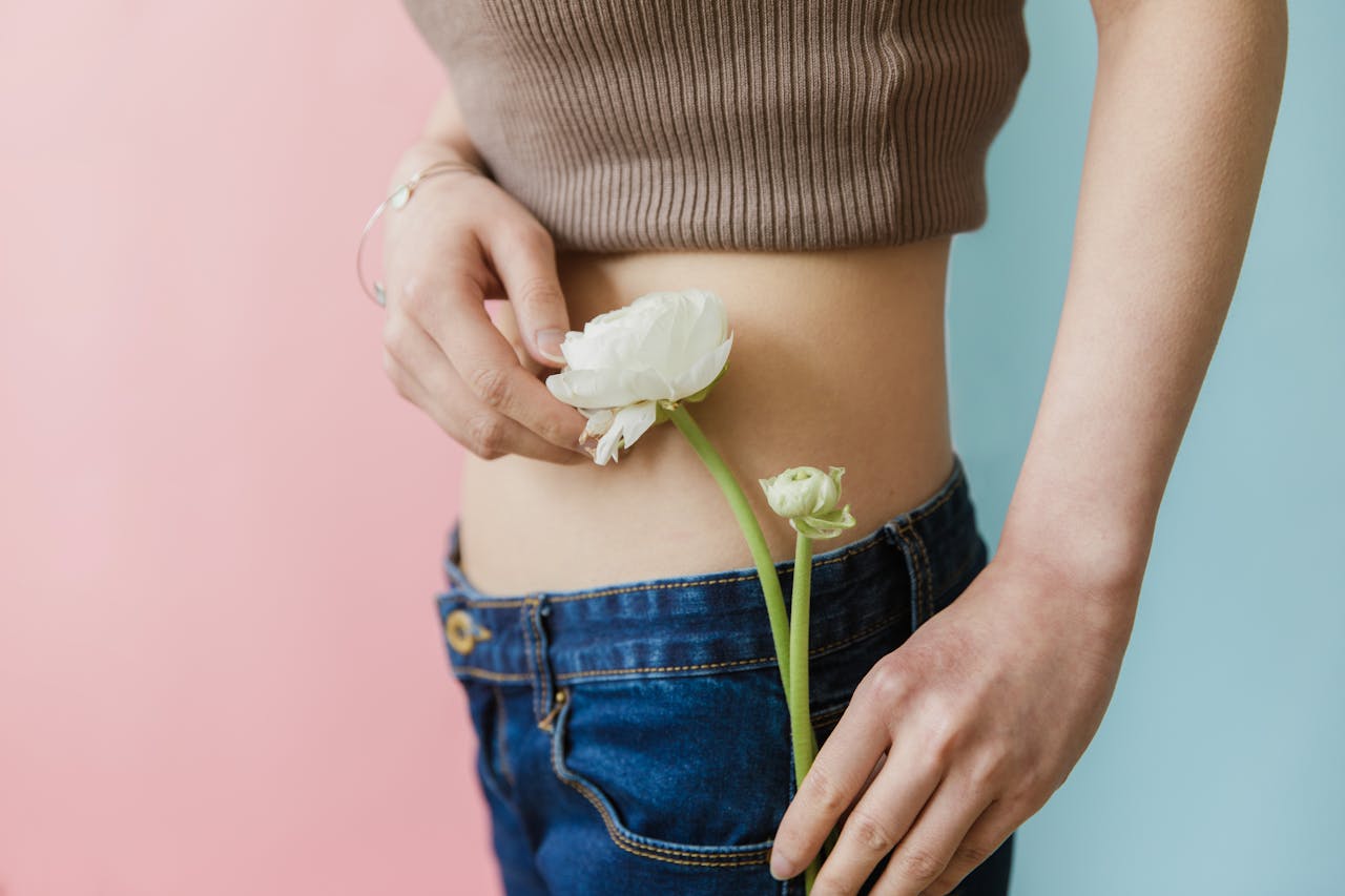 Woman Holding White Flower