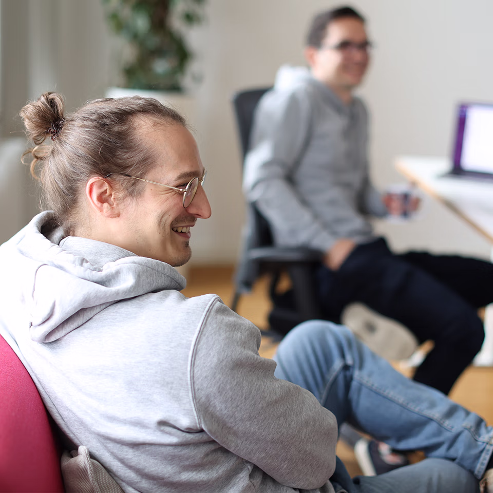 Mitarbeitende der OPEN KNOWLEDGE GmbH beim After Work