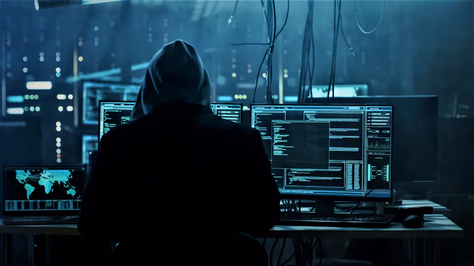 Hacker at computer