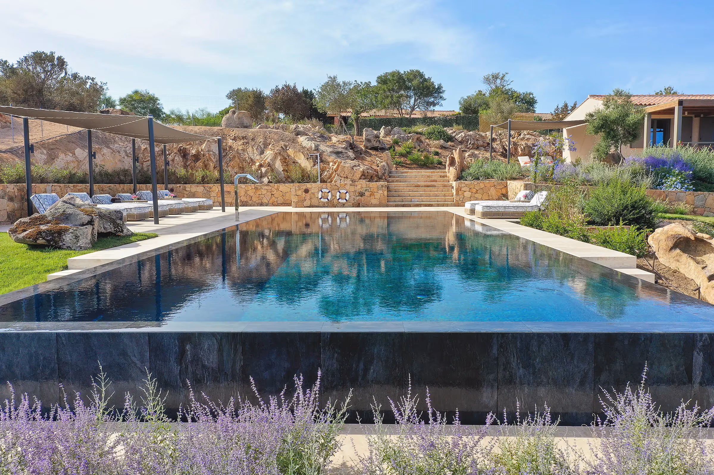 Salinedda Villa garden with pool