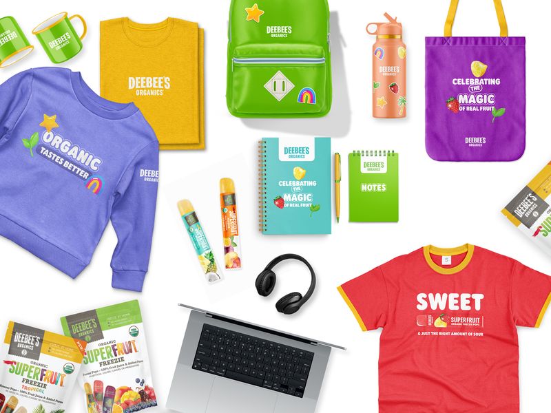 Branded merchandise design and promotional swag collection for CPG brand DeeBee's Organics, including apparel, bags, and stationery for event marketing and retail promotions