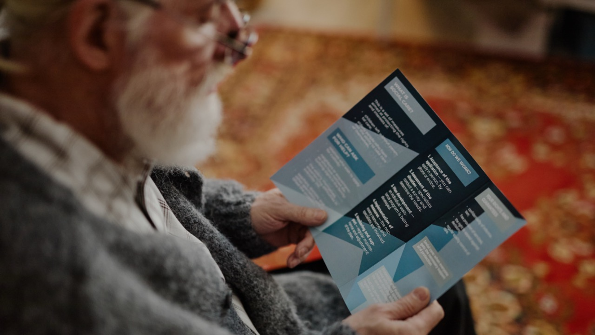 Man reading pamphlet