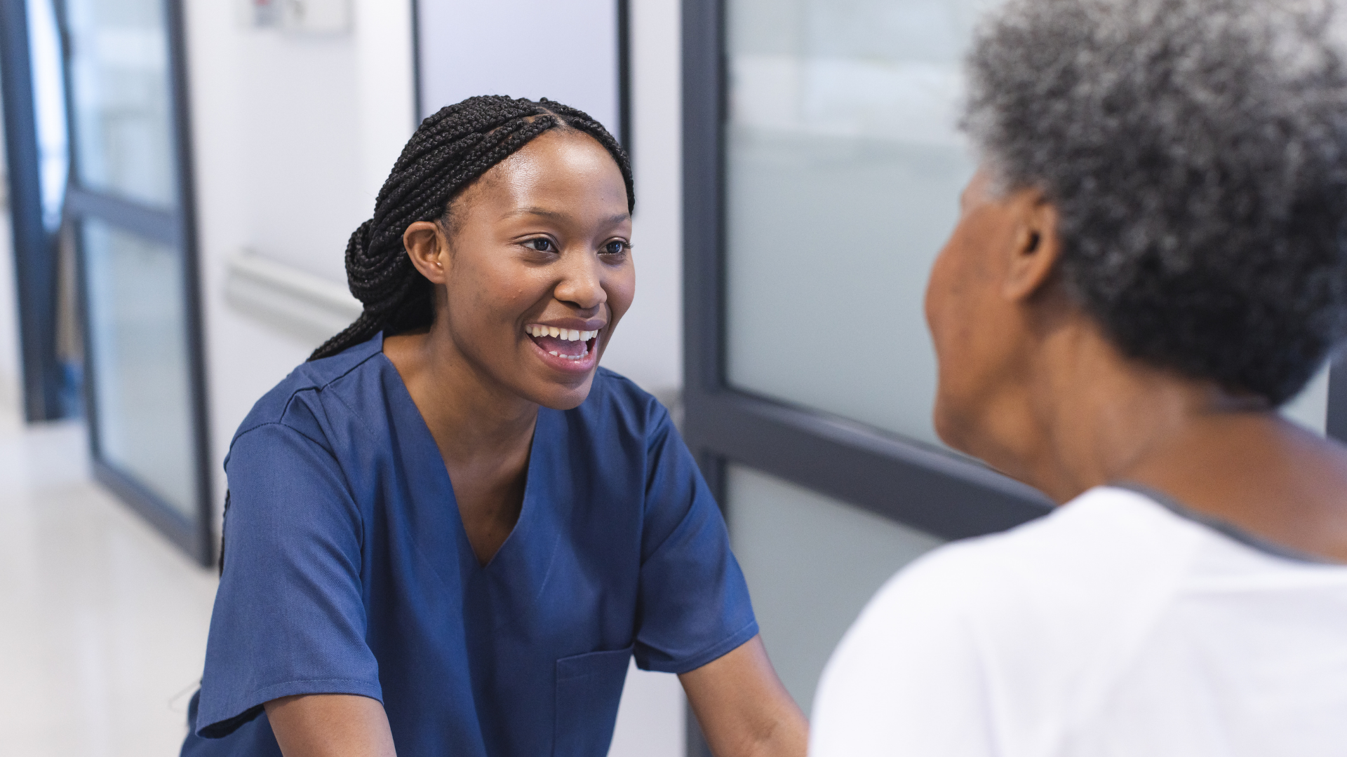 Healthcare Professional speaking to patient