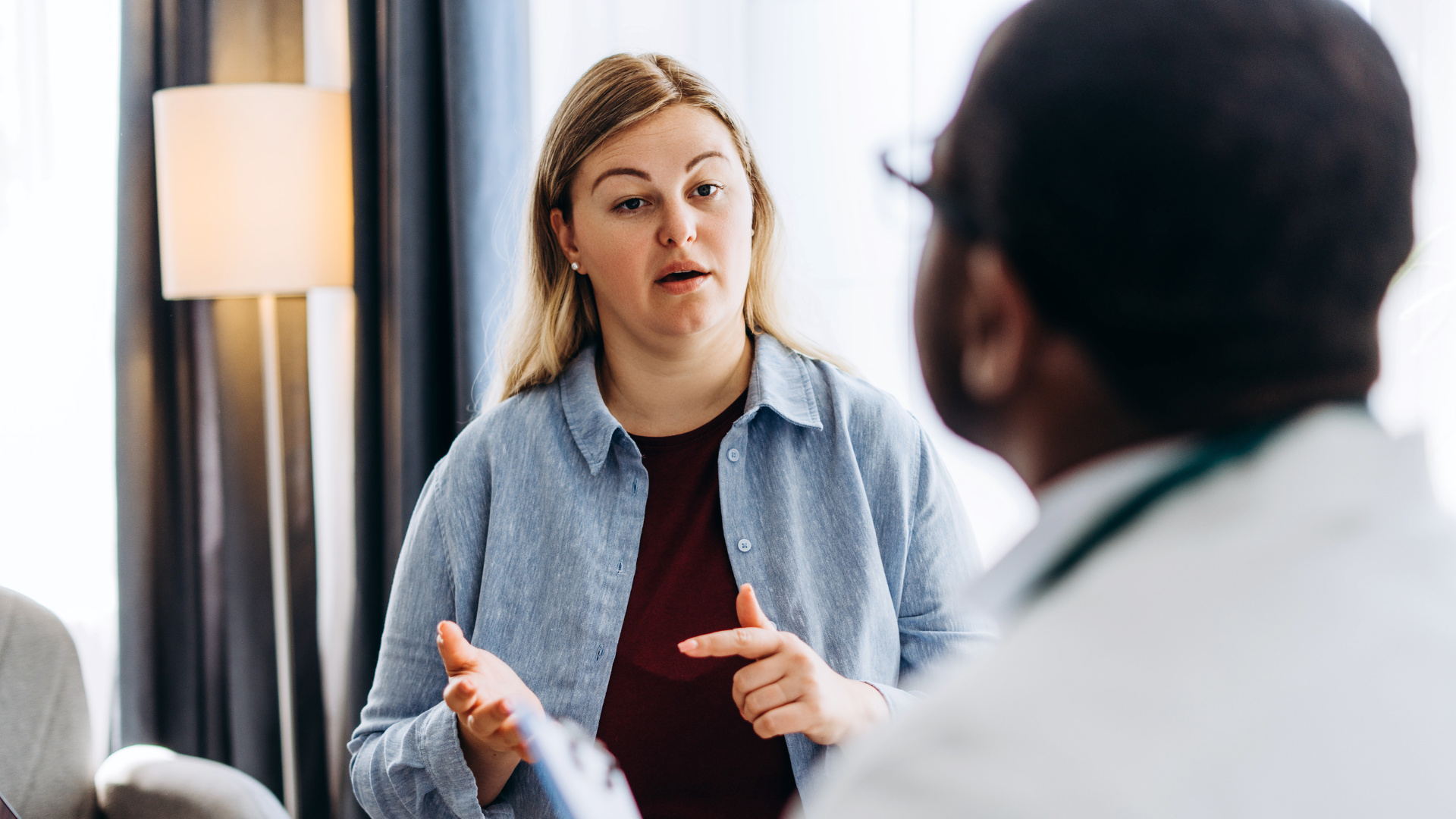 Patient speaking to healthcare professional