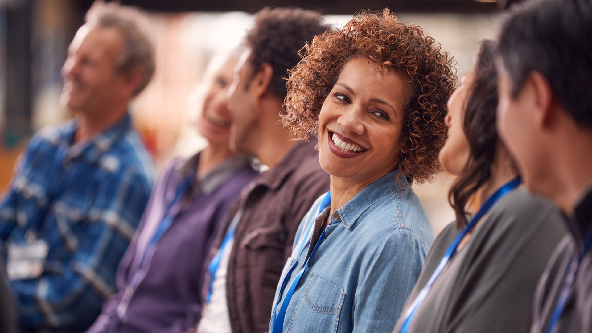 People smiling in meeting