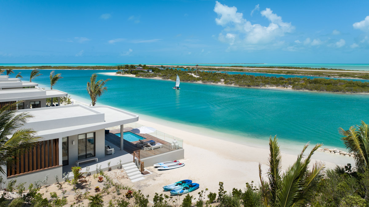 Waterside bungalow with private pool and kayaks at Ambergris Cay luxury resort, Turks and Caicos