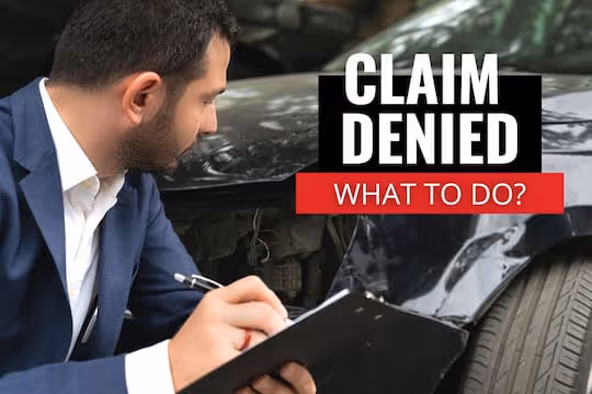 Claim Denied, What to Do? - Man assessing the car's status
