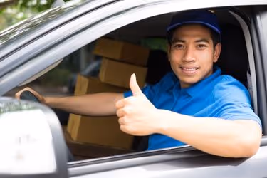 Man working as a delivery with his own car