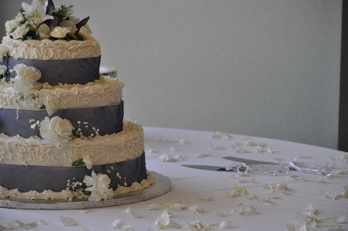 A wedding cake on a table.