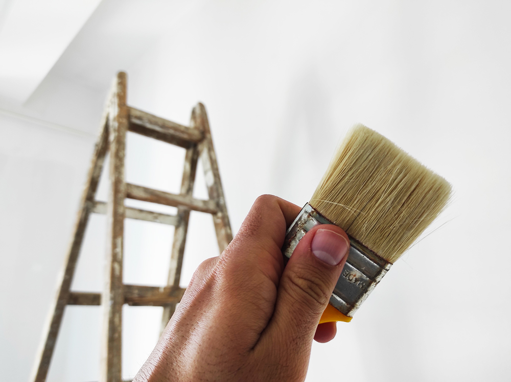 Baby gripping mother's hand