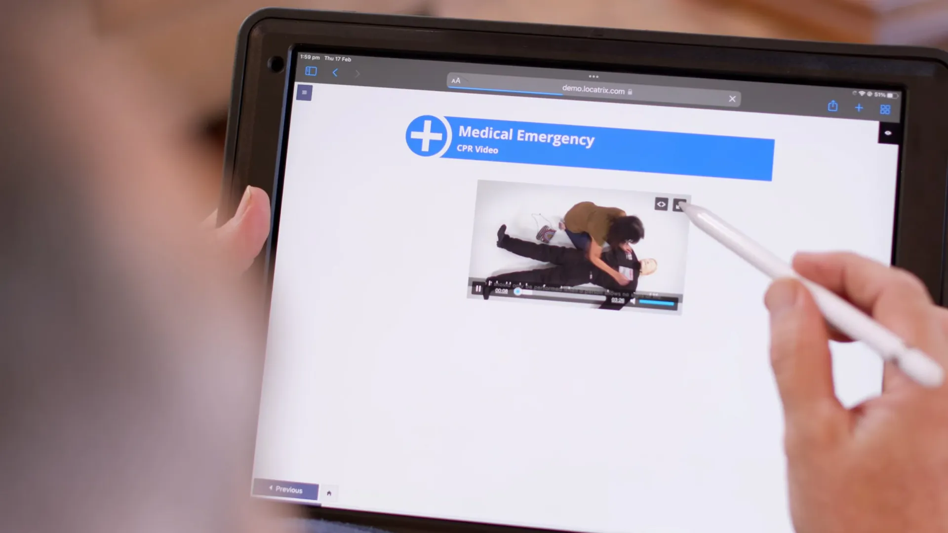 A person using a medical emergency app on a tablet.