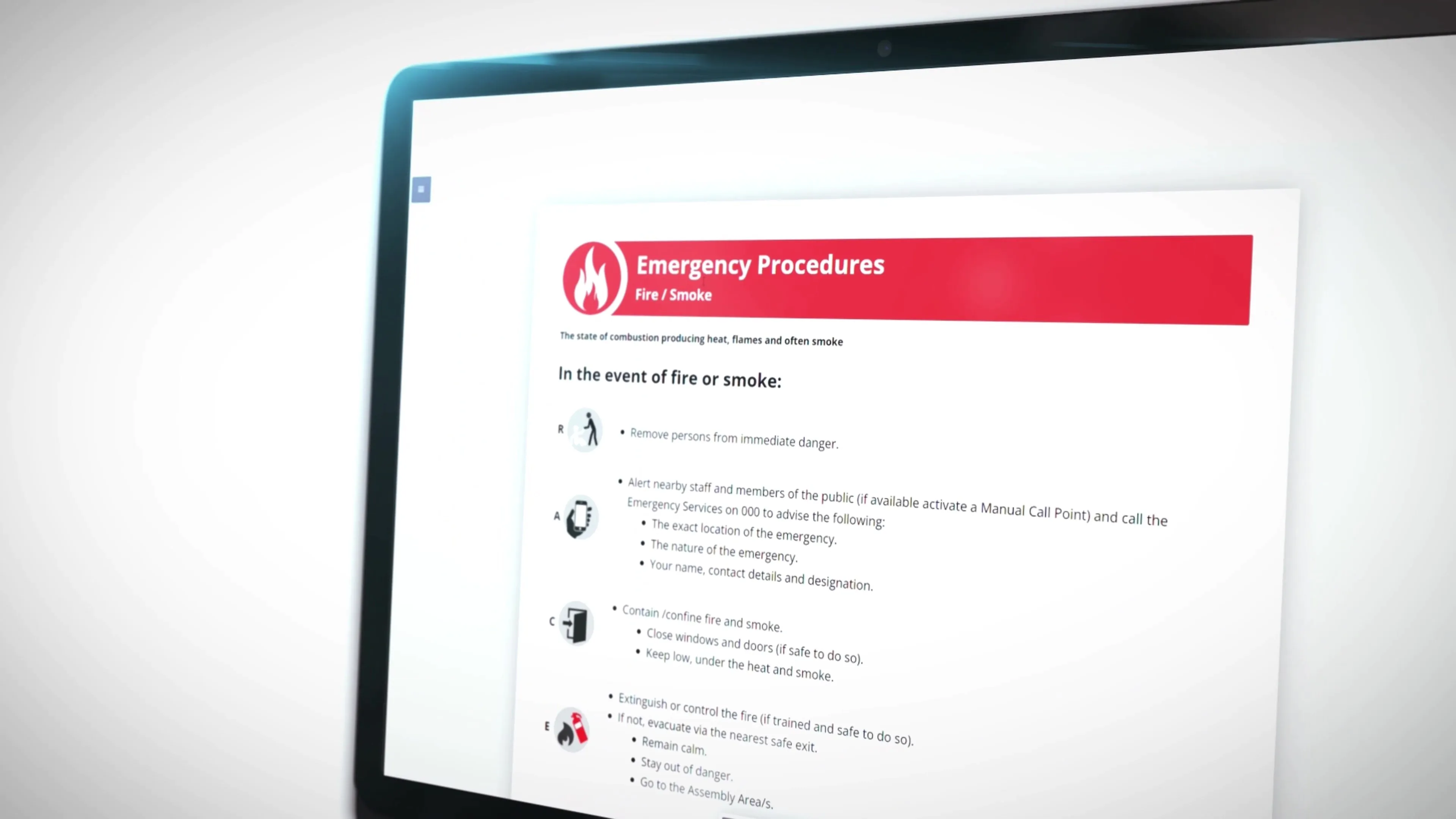 A computer screen with a red emergency procedure document on it.