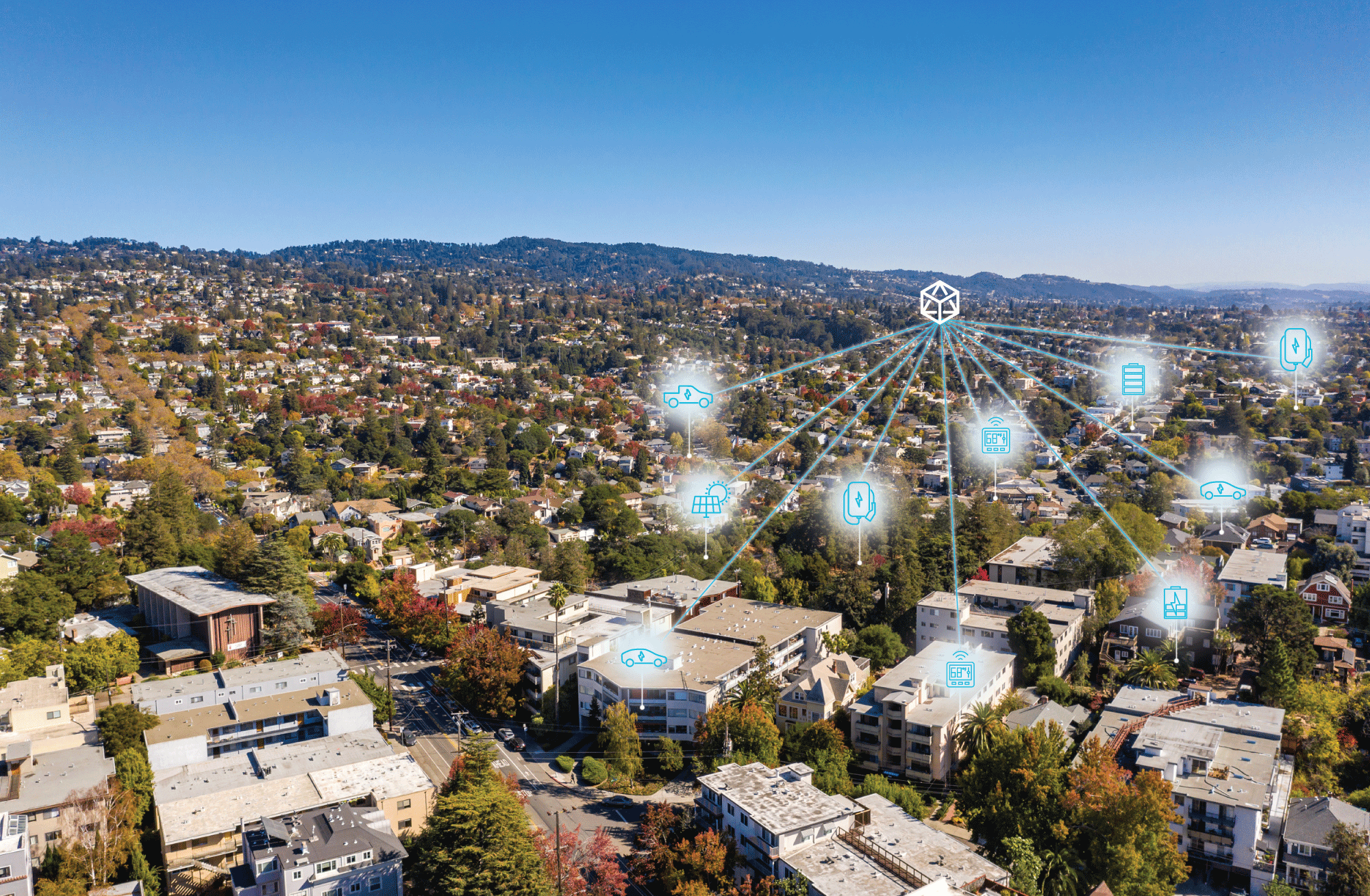 An electric vehicle driving down a highway with wind turbines in the background.