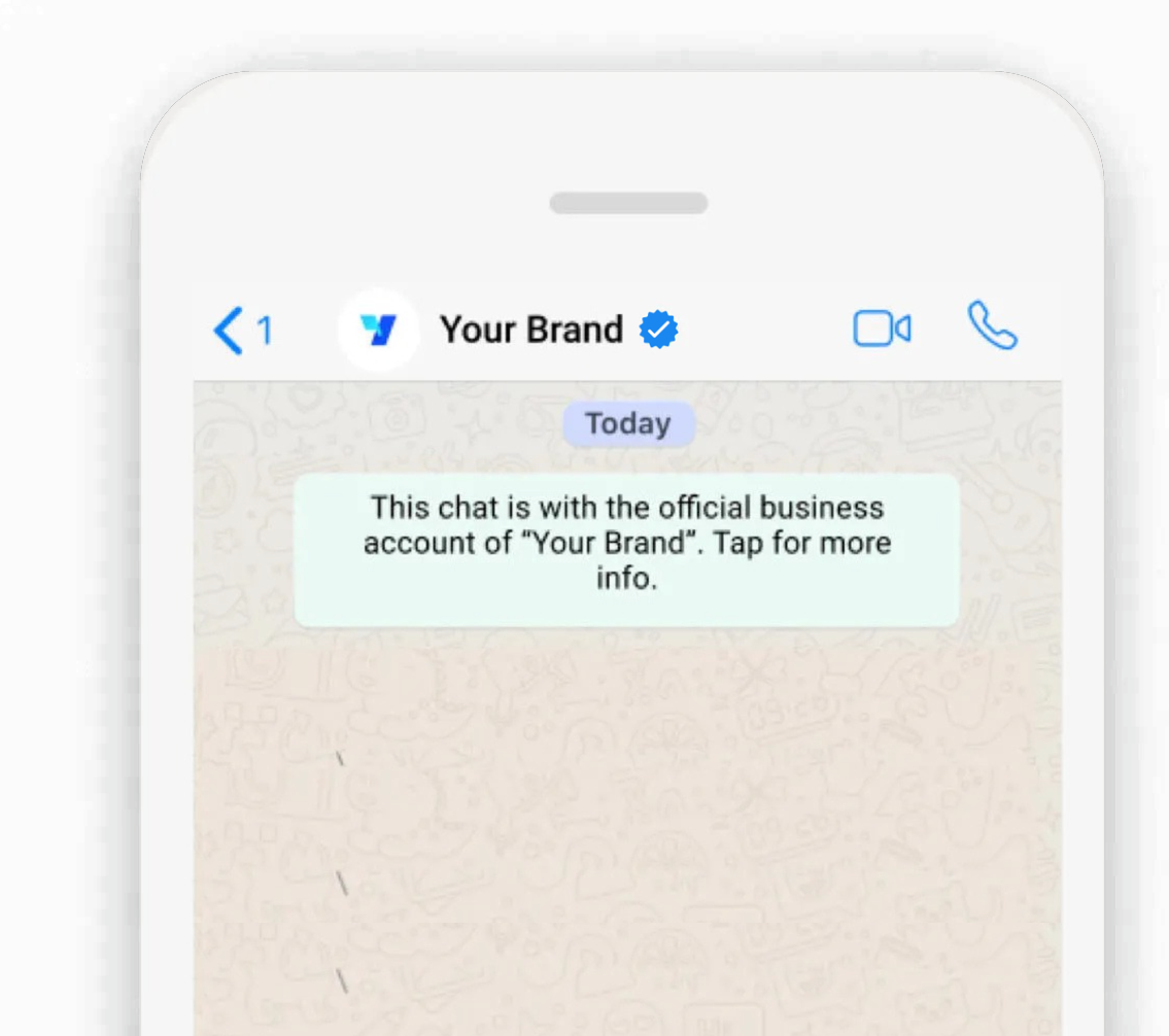 WhatsApp chat header showing a business name with the verified blue tick badge