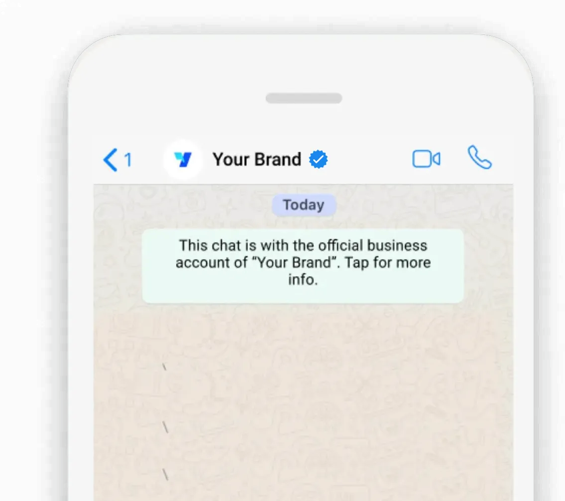 WhatsApp chat header showing a business name with the verified blue tick badge