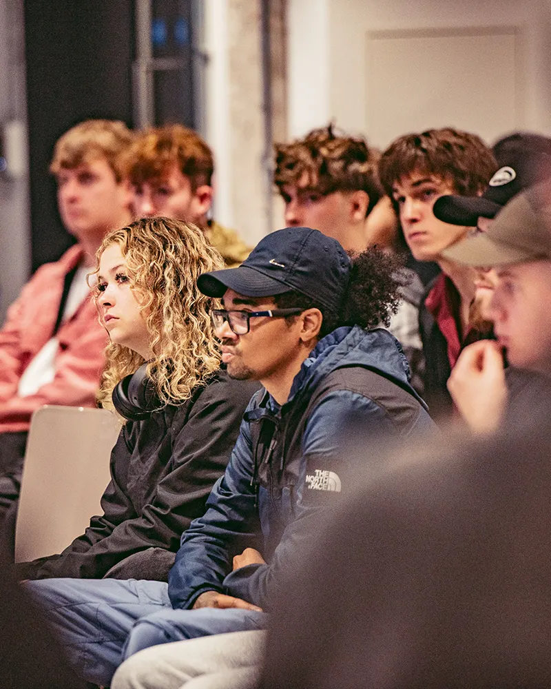 A group of dBs students together in a communal space
