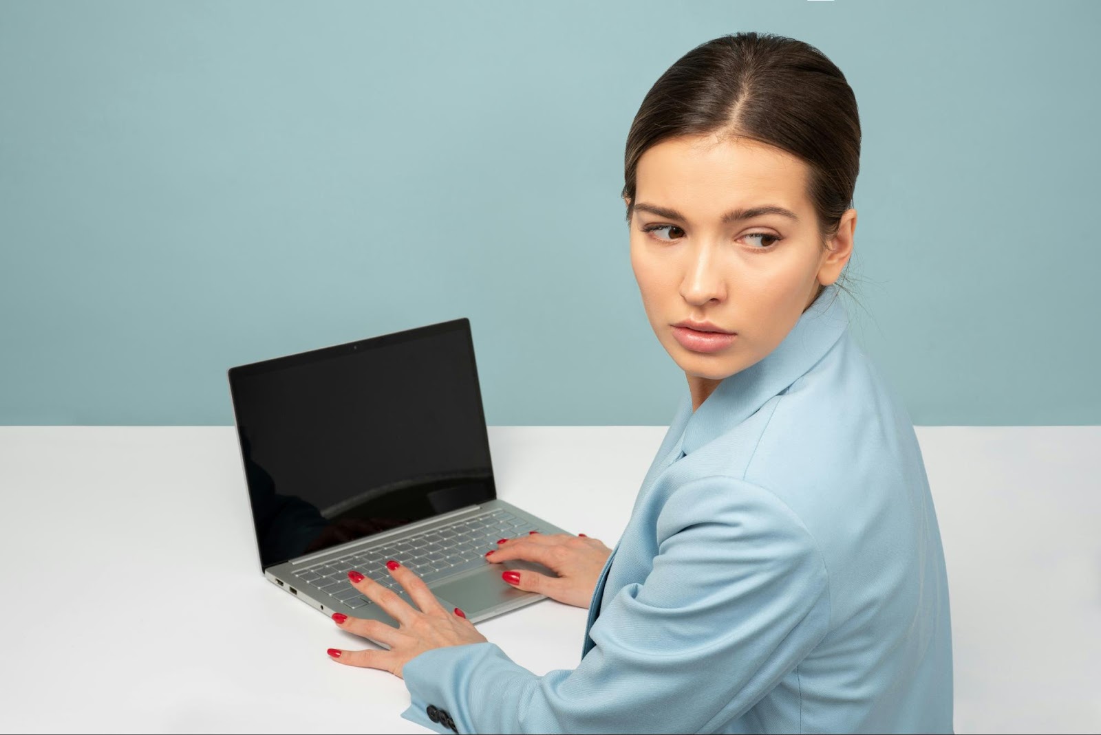 Person using telepsychiatry service on a laptop