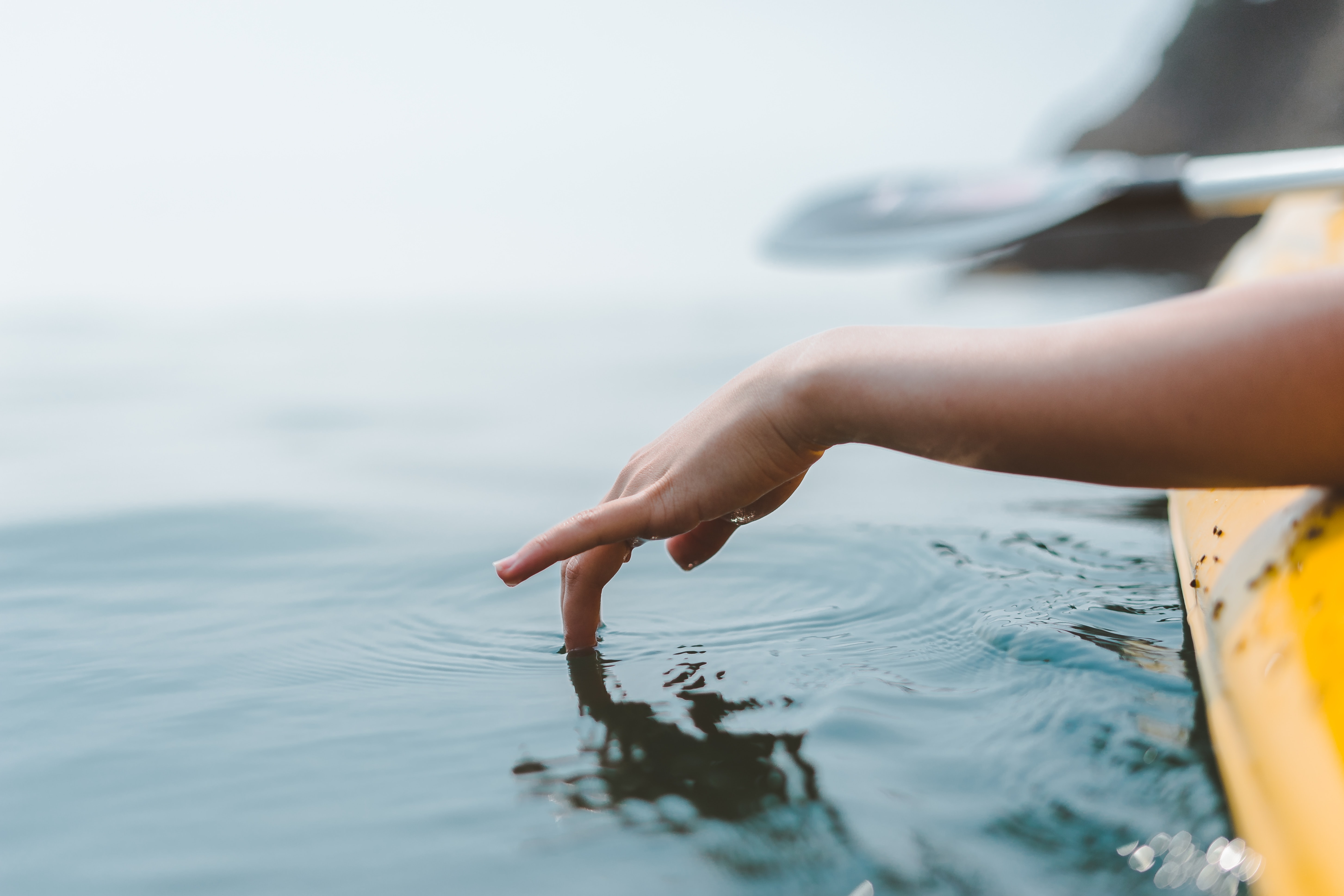 Touching water while in kayak