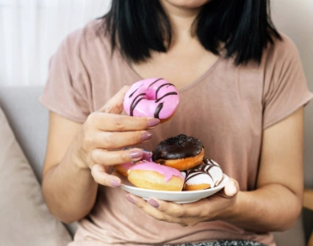 Plate of donuts representing high-sugar foods that may trigger emotional eating after gastric bypass