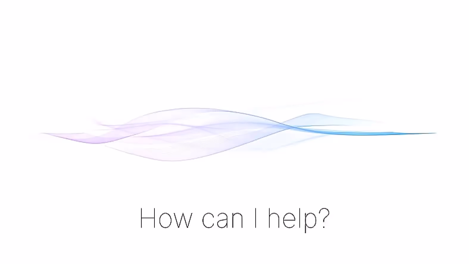 a computer monitor and a speaker on a desk