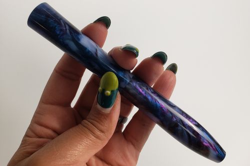 Sculpted and painted rotted teeth on a very large cigarette