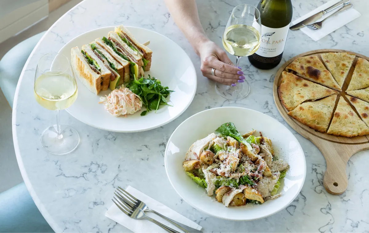 Club sandwich and Caesar salad at Park Kitchen