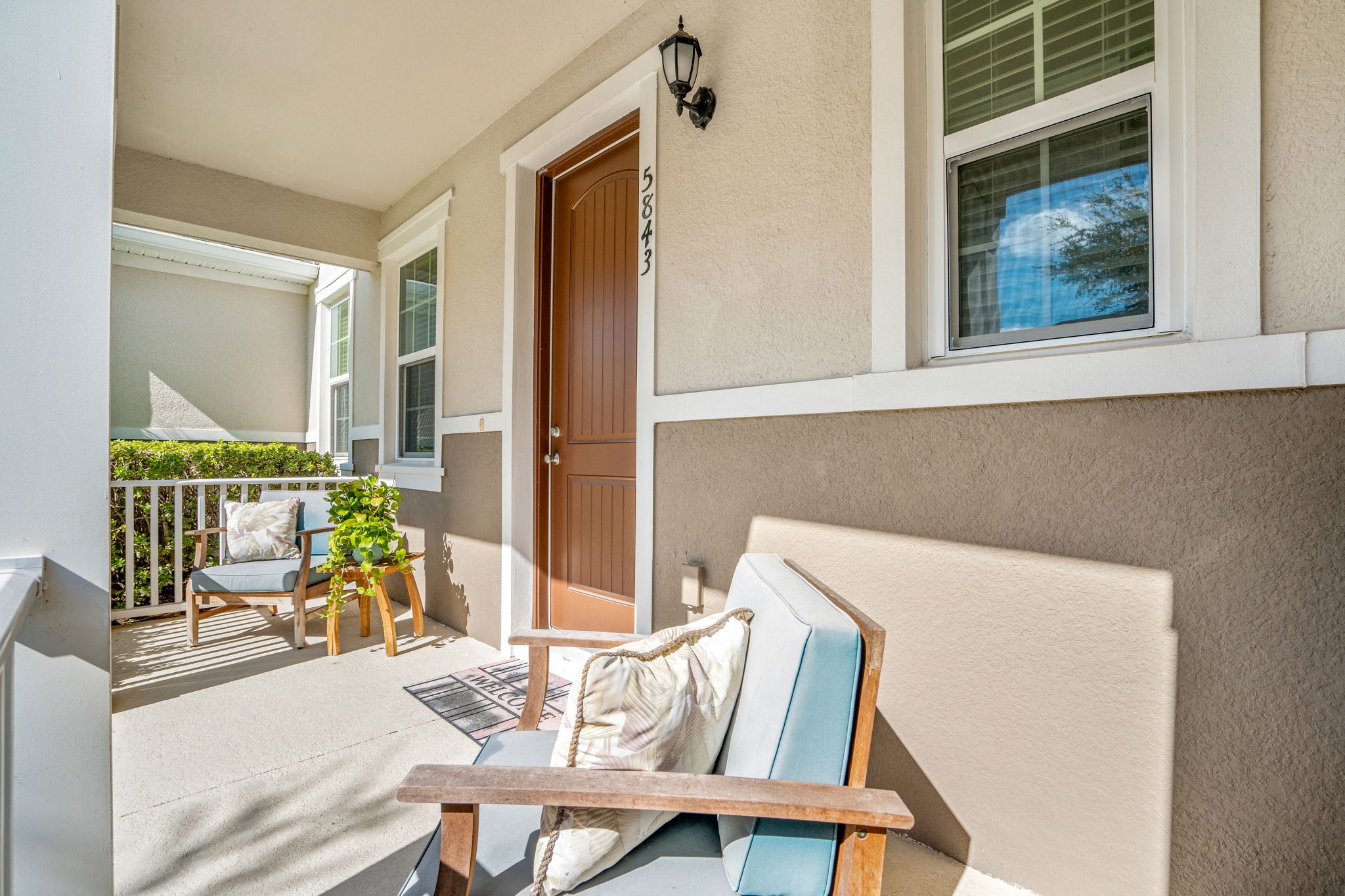 Covered front porch of a Central Florida rental home, ideal for investment buyers