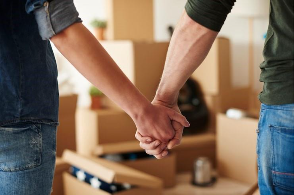 Close up of couple holding hands