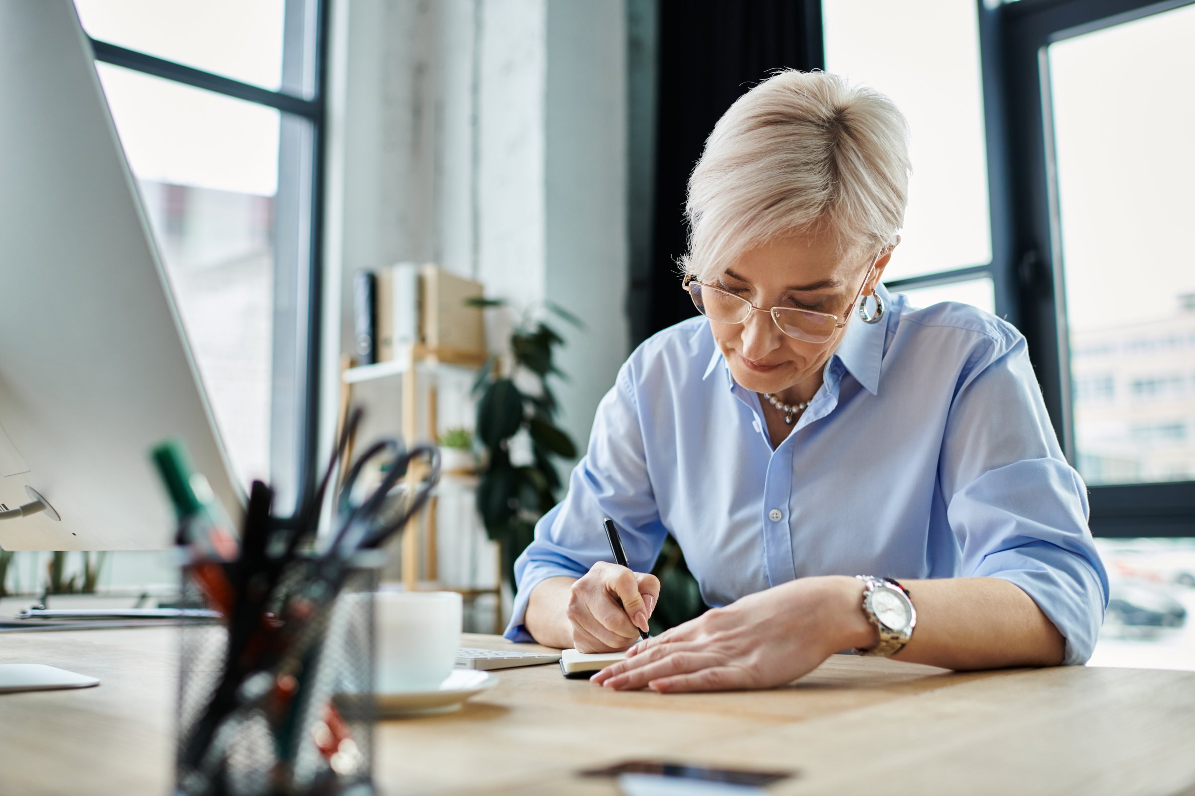 A business professional working at a desk