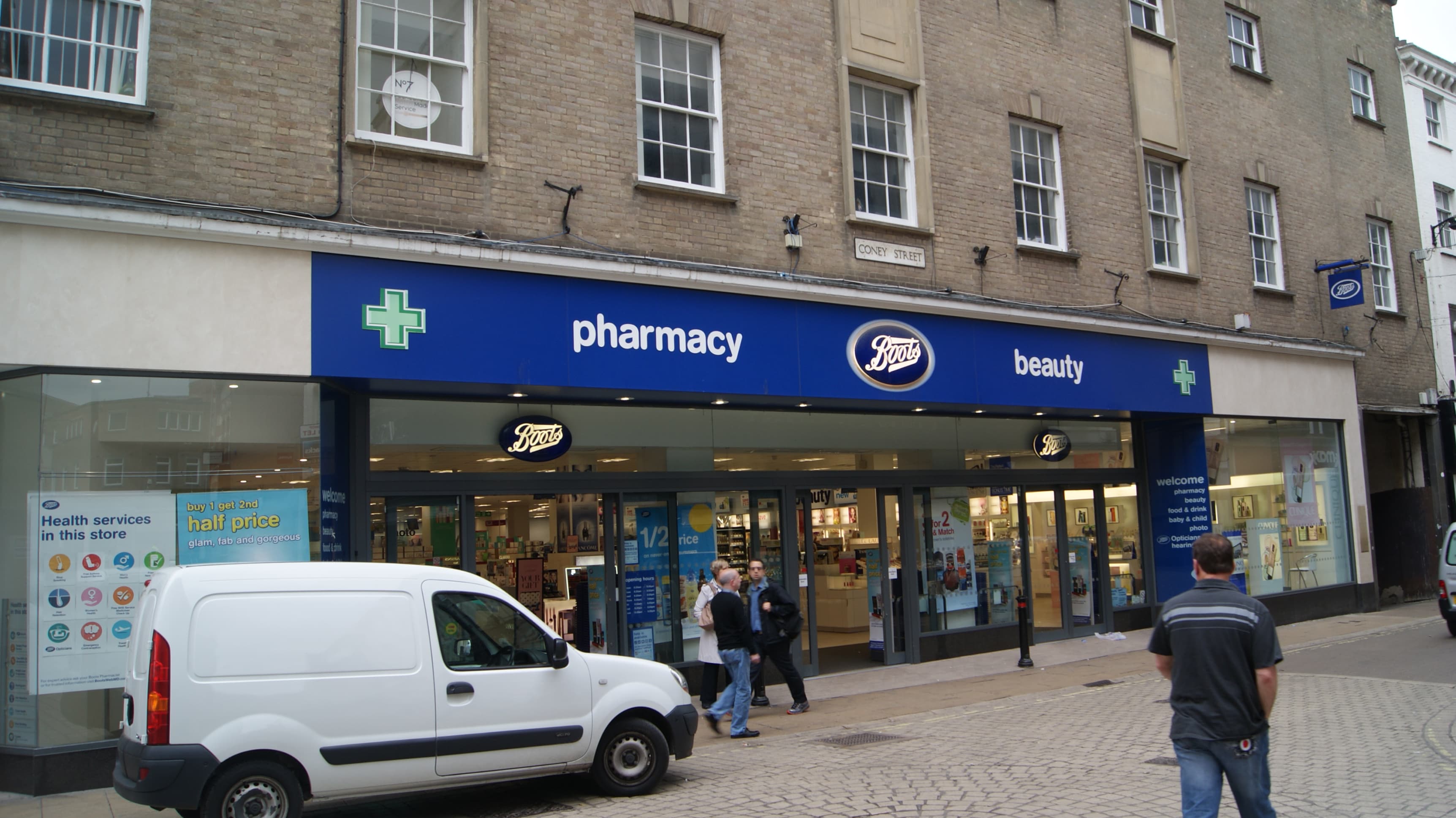 Boots storefront before the rebrand, showing the old logo and colors.